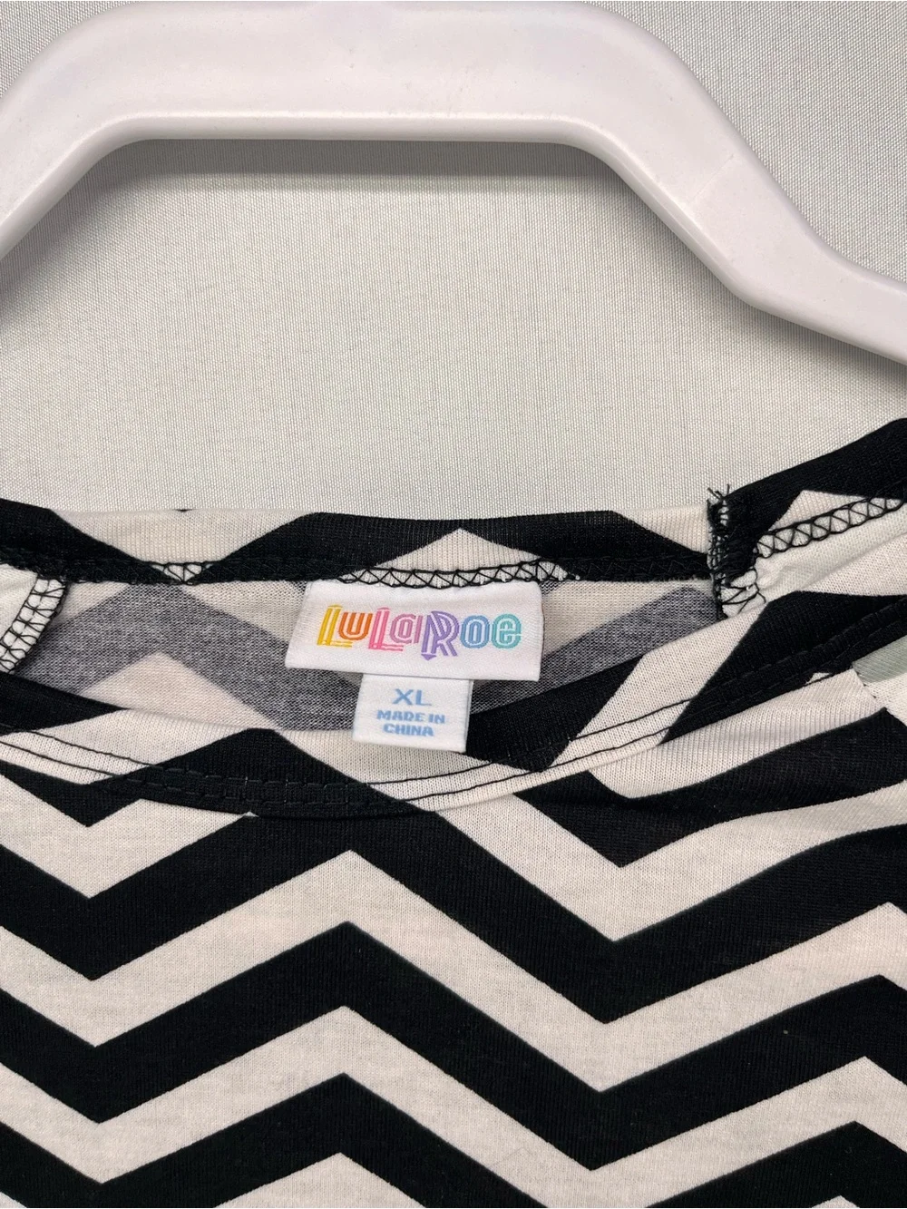LuLaRoe Randy Black & White Chevron Raglan Tunic with Polka Dot Sleeves - Picture 2 of 6